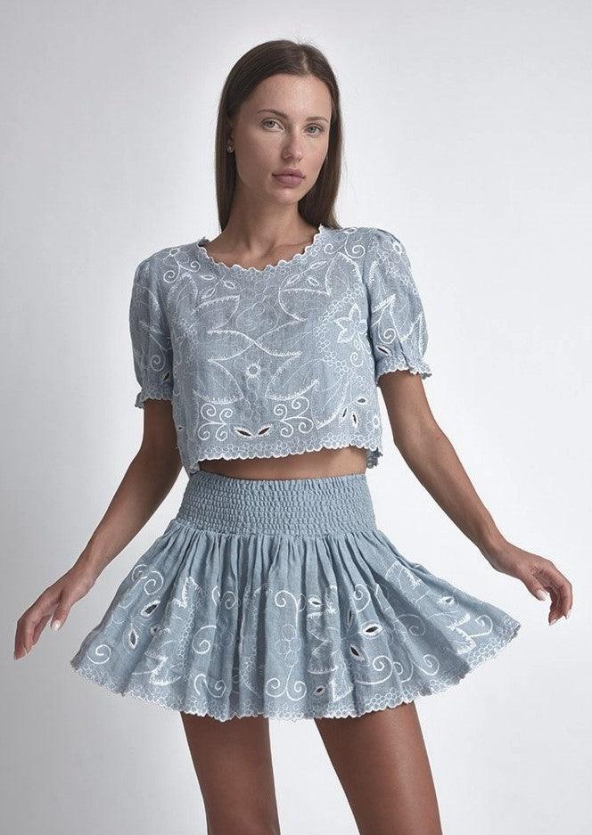 Long skirt with embroidered crop clearance top